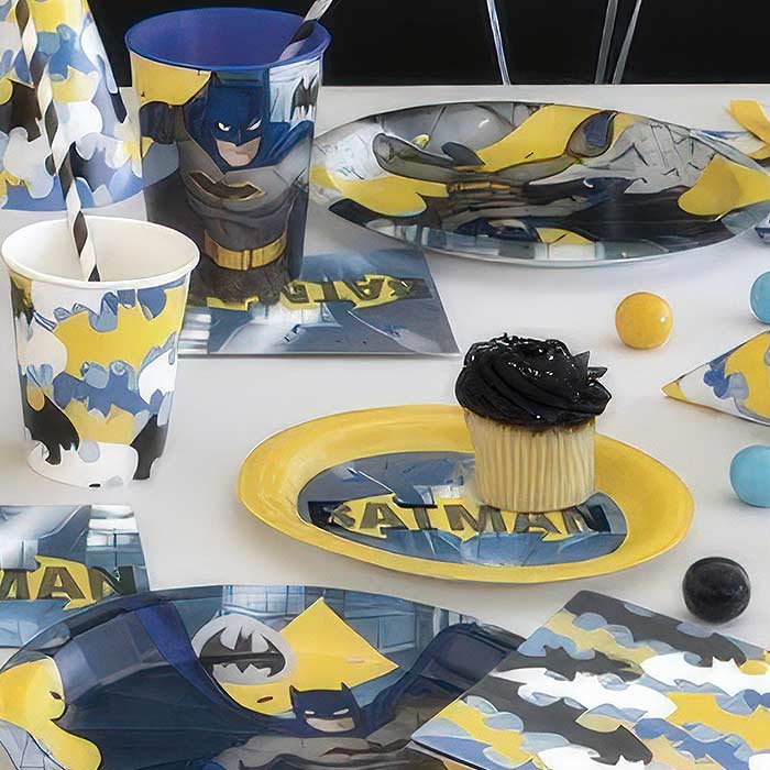 Batman Party Accessories including themed plates, cups, and decorations for a heroic birthday celebration