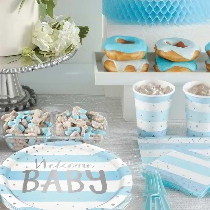 Blue and Gold Nude Ombre Baby Shower Theme with Elegant Tableware and Decorations Celebrating a Baby Boy