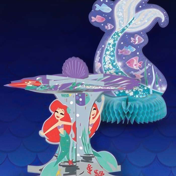 Colorful Mermaid Party Table Decorations featuring vibrant centerpieces and sea-themed designs
