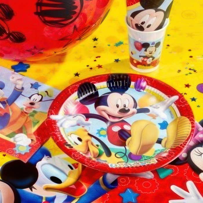 Vibrant Mickey Mouse Party Items including tableware, balloons, and decorations for a fun celebration