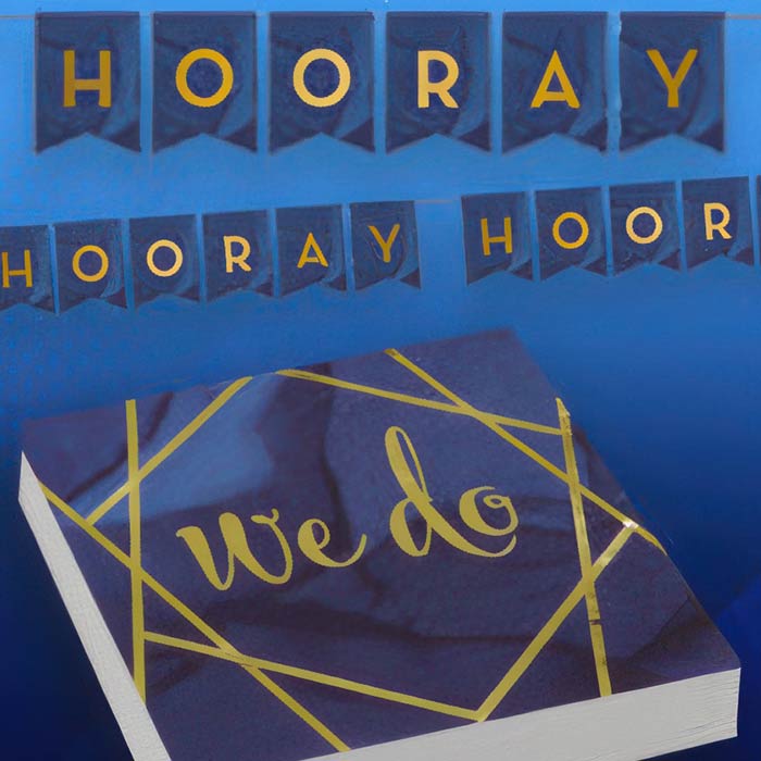 Elegant Blue and Gold Wedding Decor featuring geometric designs and celebratory banners for special occasions.