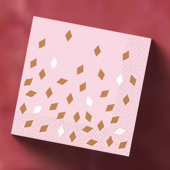 Elegant rose gold napkins with decorative confetti design perfect for weddings and special celebrations