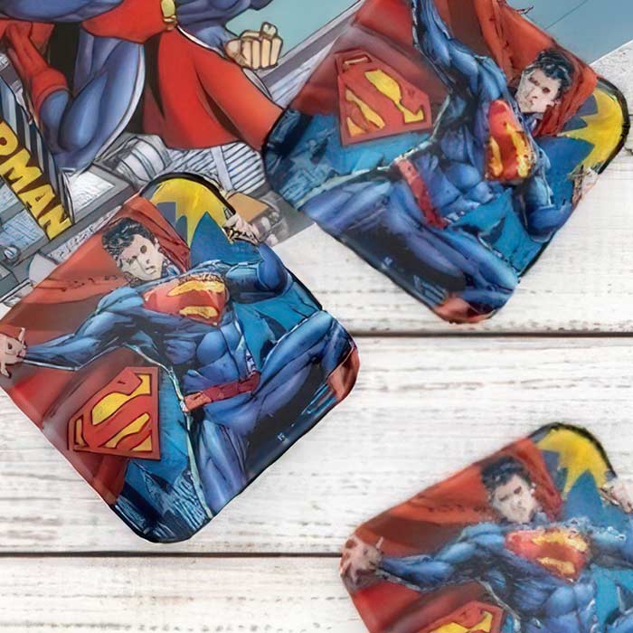 Superman Birthday Party Supplies featuring vibrant decorations, tableware, and themed party items for superhero fans