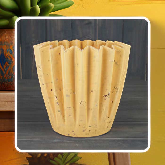 Stylish Yellow Plant Pot with a unique ribbed design, perfect for brightening home decor